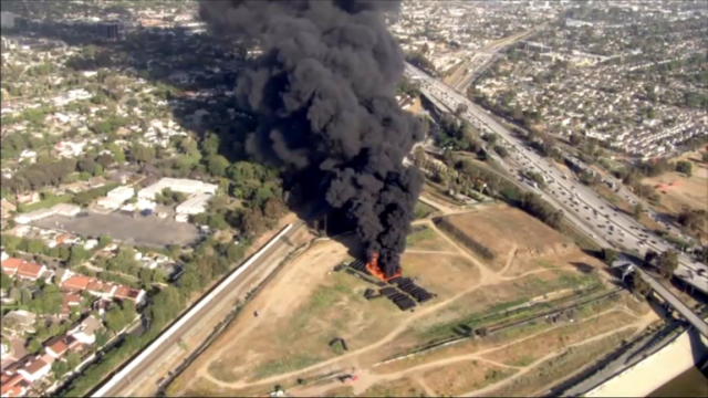 Crews Extinguish Fire Burning Thick Plastic Tubes in Long Beach